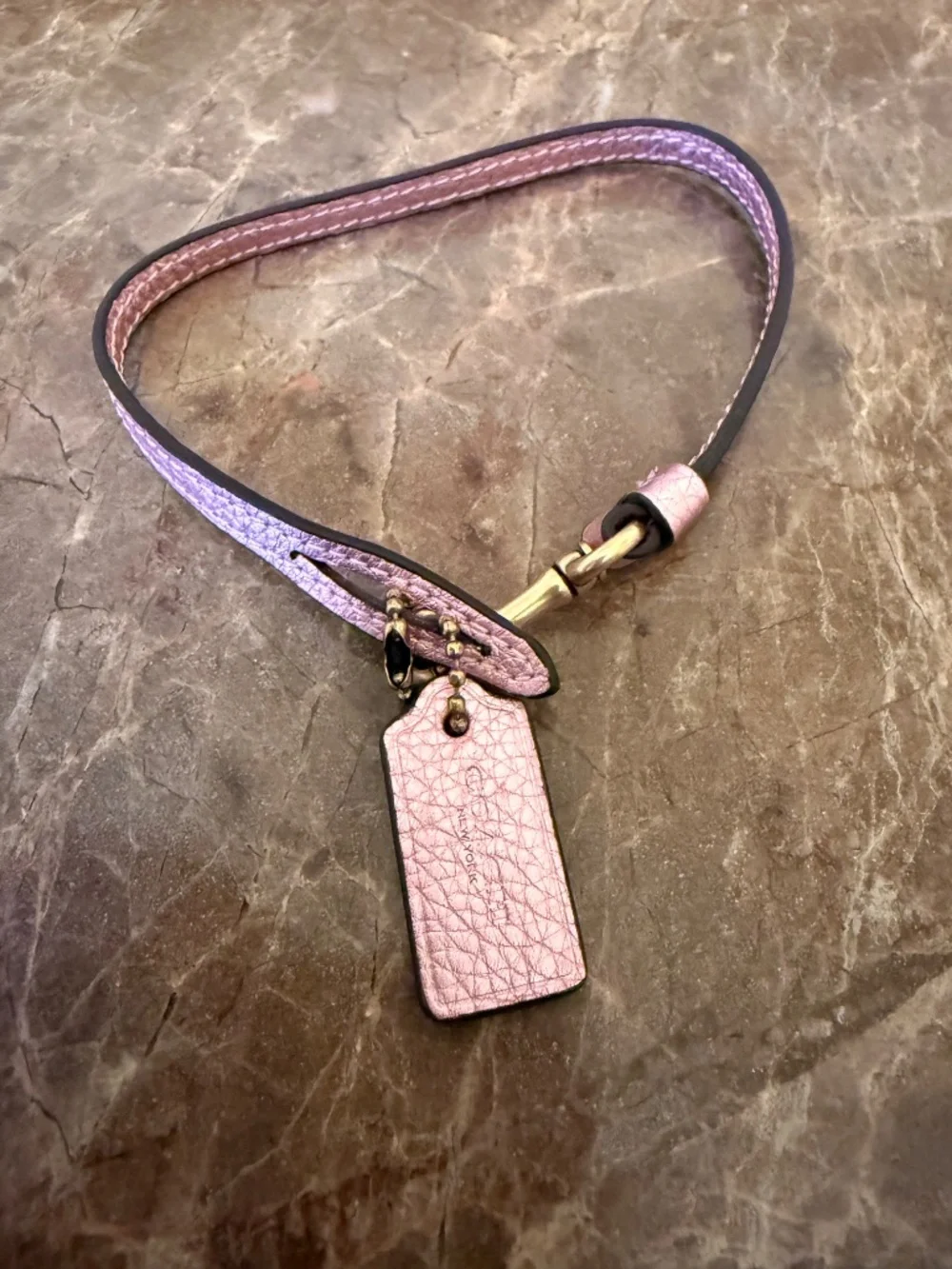 Coach Pebbled Leather Wrist Strap Loop Bag Charm with Hangtag Metallic Pink